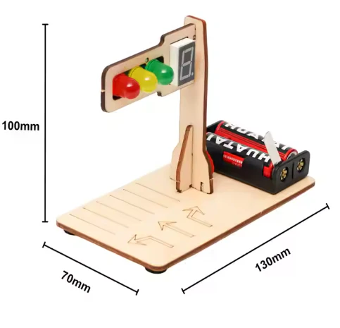 Vue rapprochée du feu de circulation jouet – boutons de couleur rouge, orange, vert